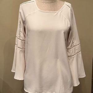 Beautiful cream blouse with detailed sleeves
